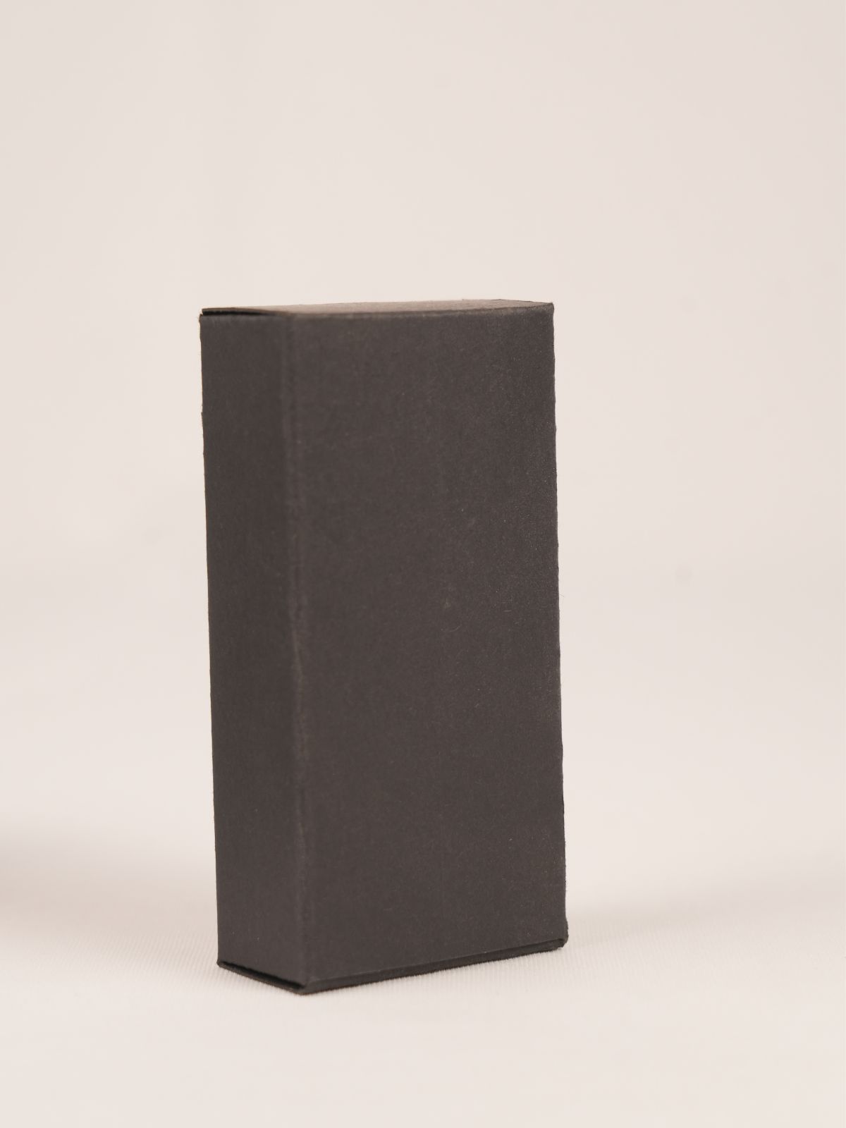 Black cardboard boxwith lid